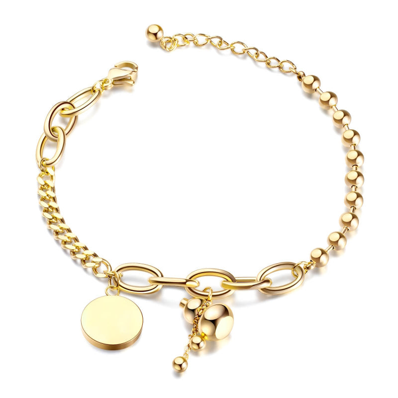 18K gold PVD coated waterproof, non-tarnish, hypoallergenic gold charm bracelet.