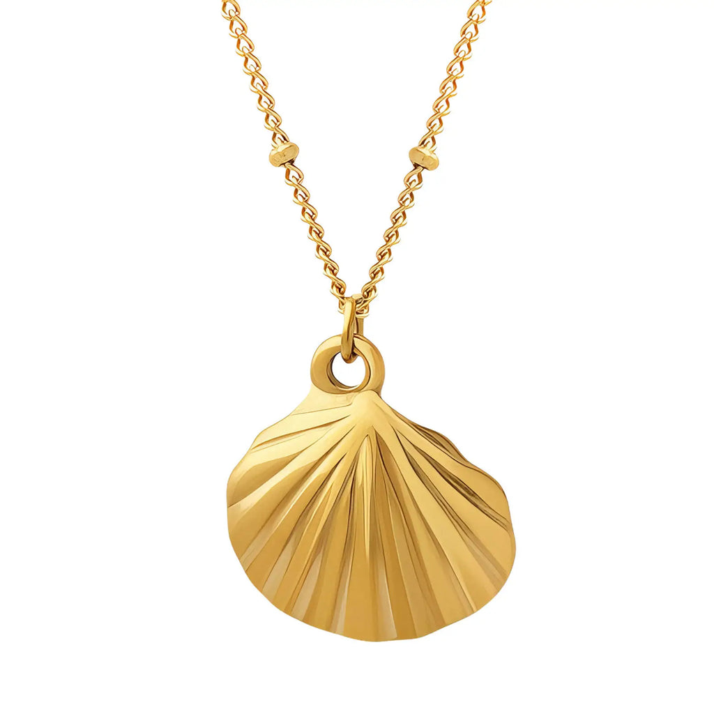 Gold shell pendant necklace on a white background