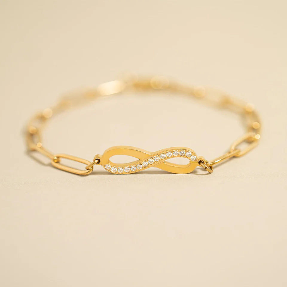 18K gold PVD coated waterproof, non-tarnish, hypoallergenic infinity bracelet.