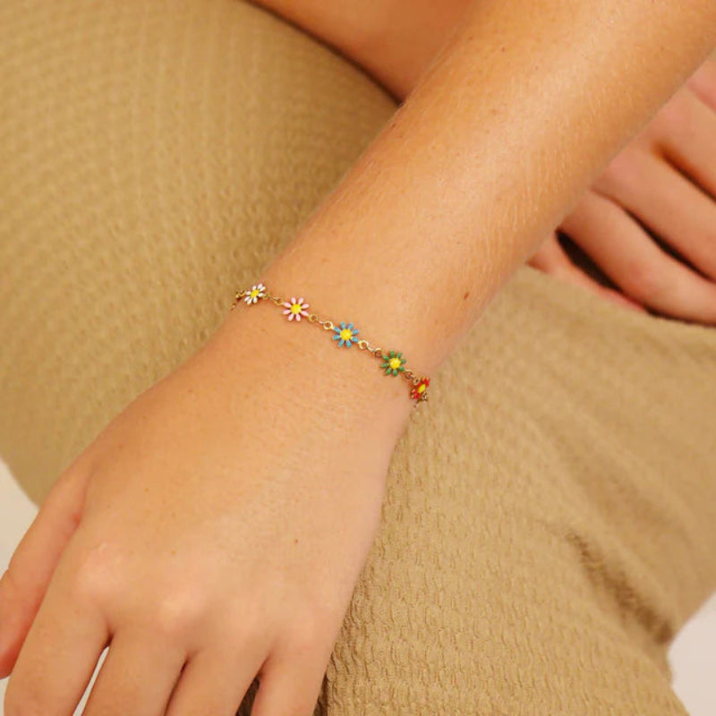 18K gold PVD coated waterproof, non-tarnish, hypoallergenic flower bracelet.