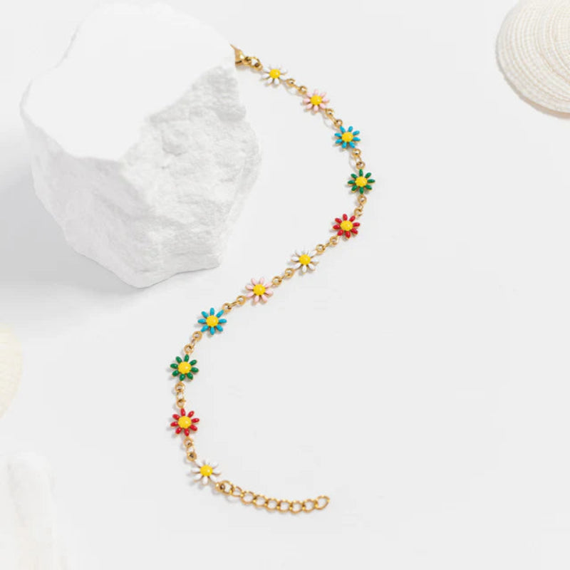 18K gold PVD coated waterproof, non-tarnish, hypoallergenic flower bracelet.