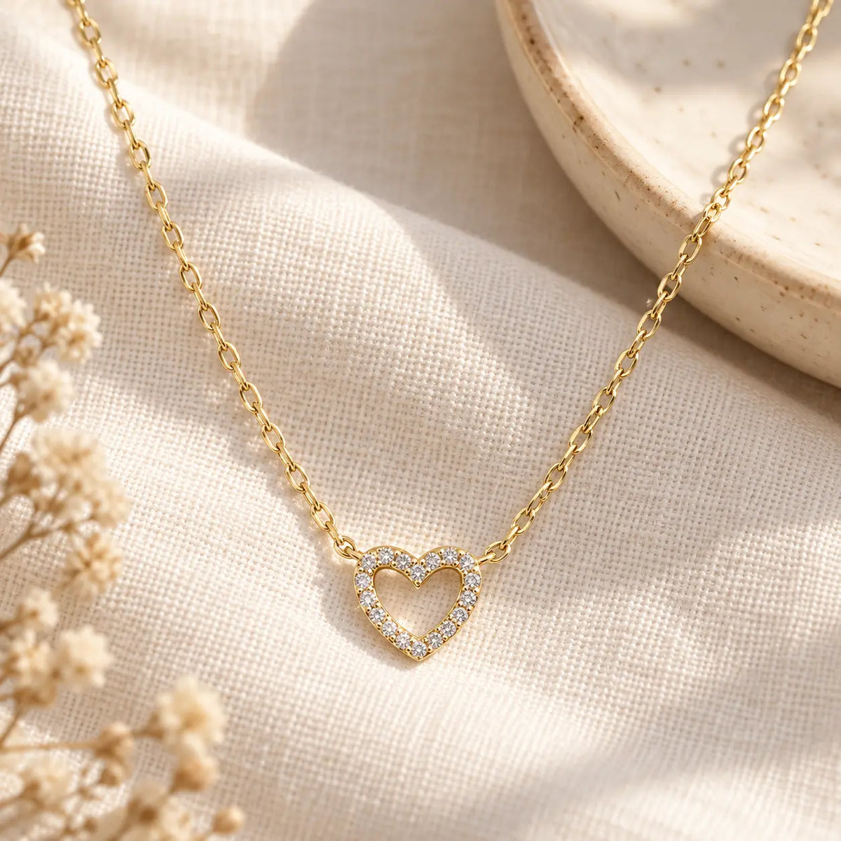 diamond heart necklace on linen