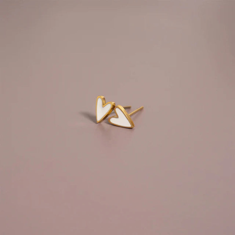 18K gold PVD coated waterproof, non-tarnish, hypoallergenic white enamel heart earrings.