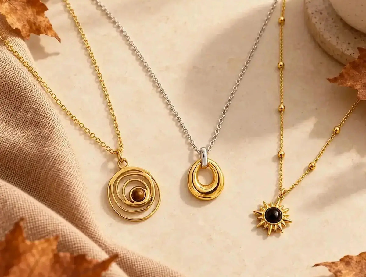 Joyce Clark Design collection of affordable waterproof gold jewelry, including necklaces, bracelets, and earrings.