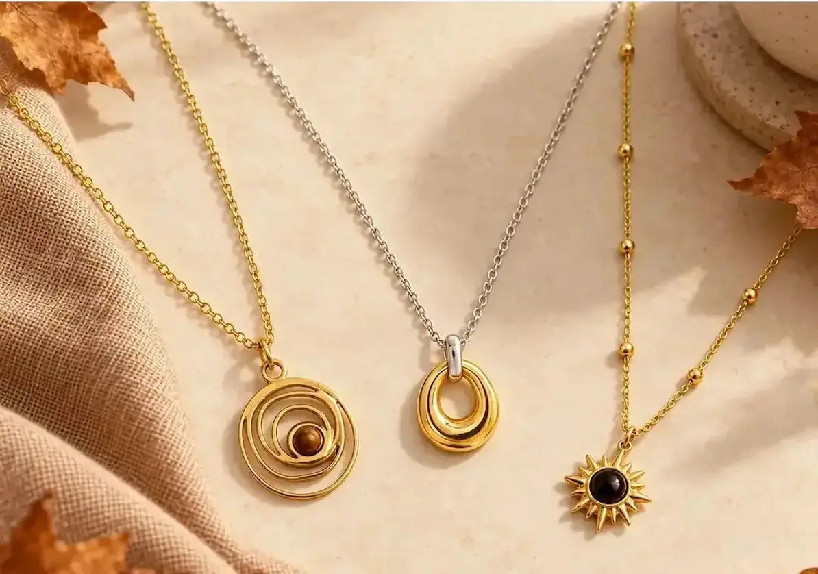 Joyce Clark Design collection of affordable waterproof gold jewelry, including necklaces, bracelets, and earrings.