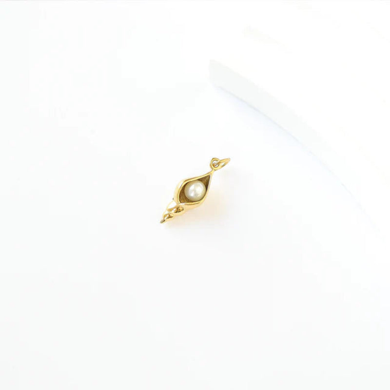 conch shell charm with pearl