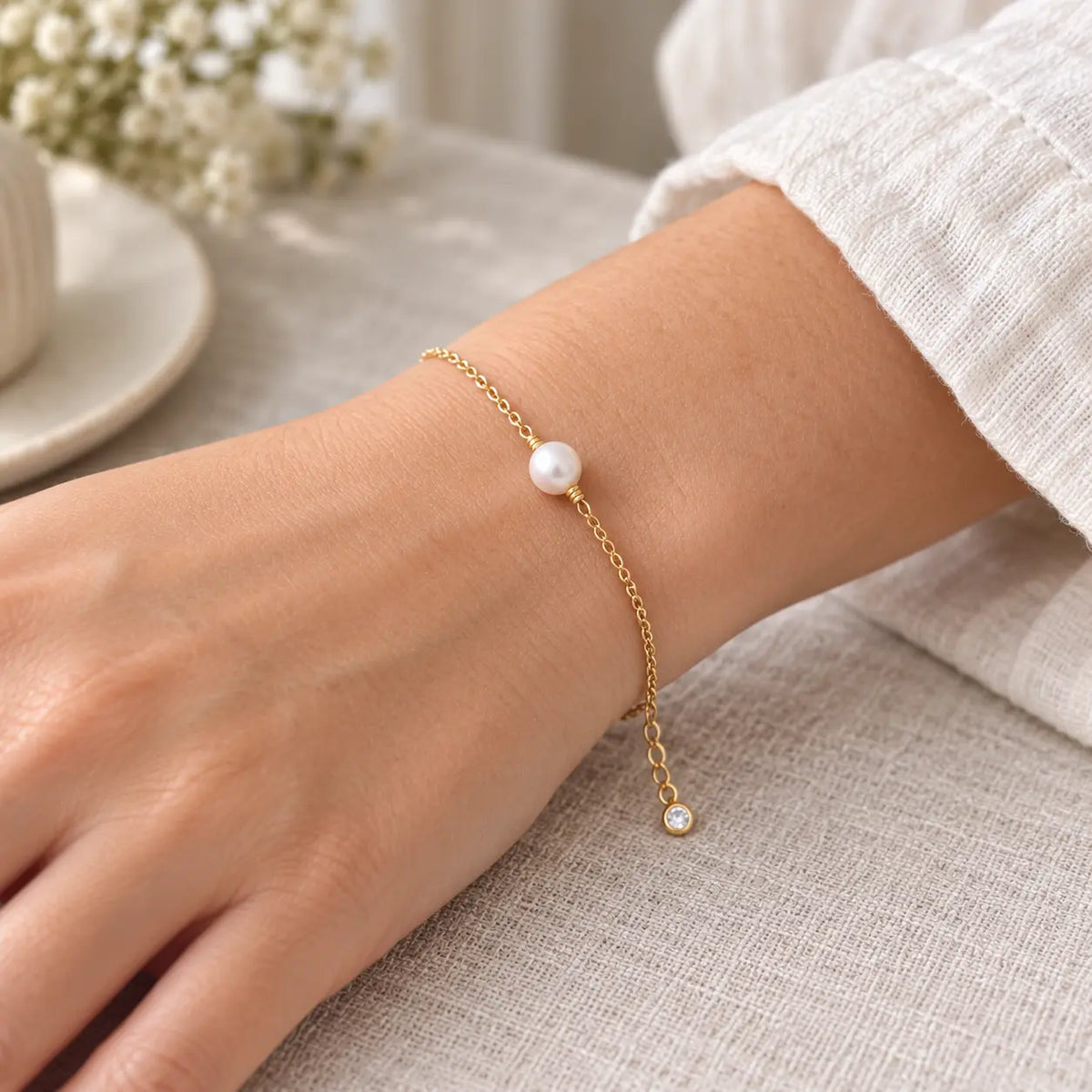 single pearl on a dainty chain bracelet