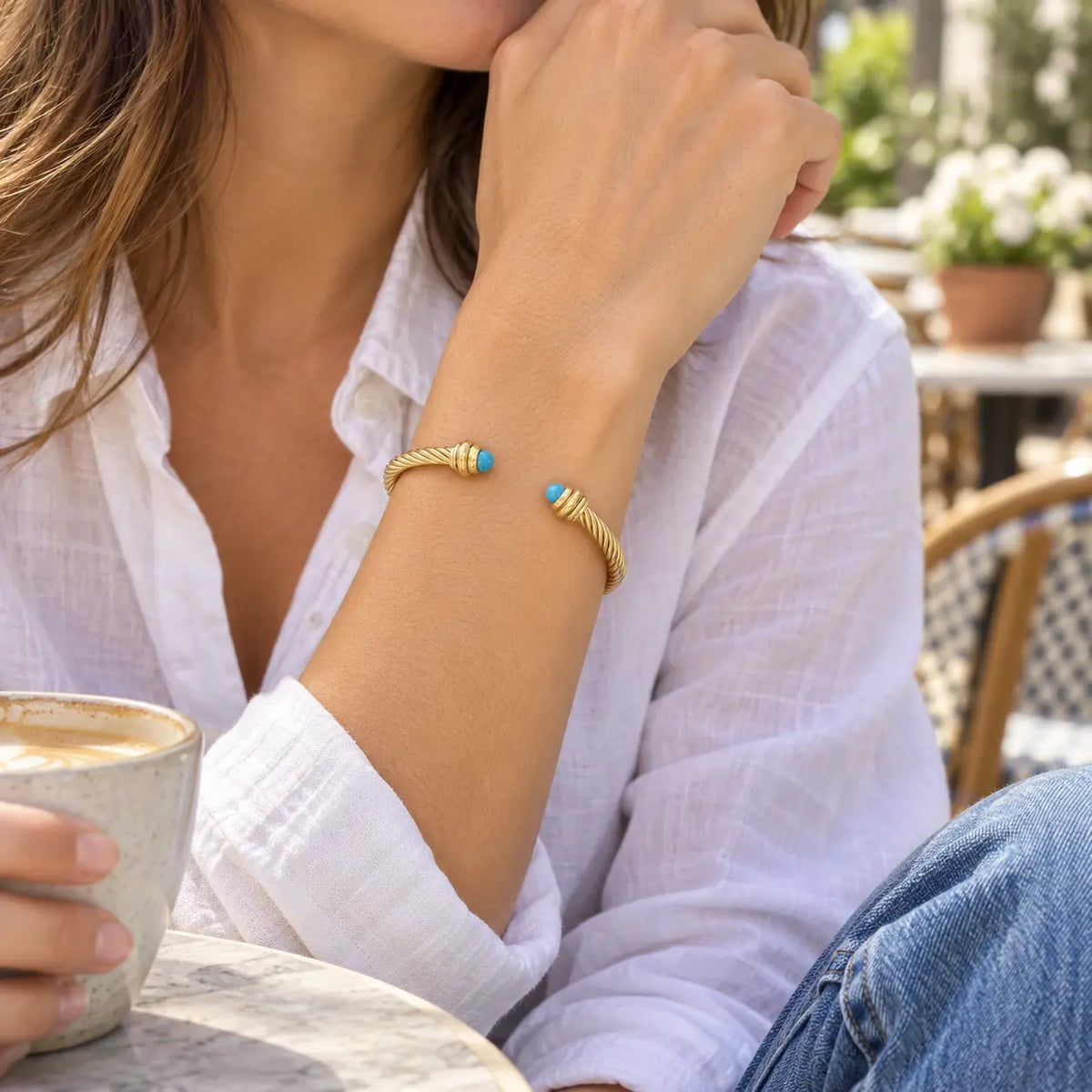 woman wearing turquoise twisted cuff bracelet