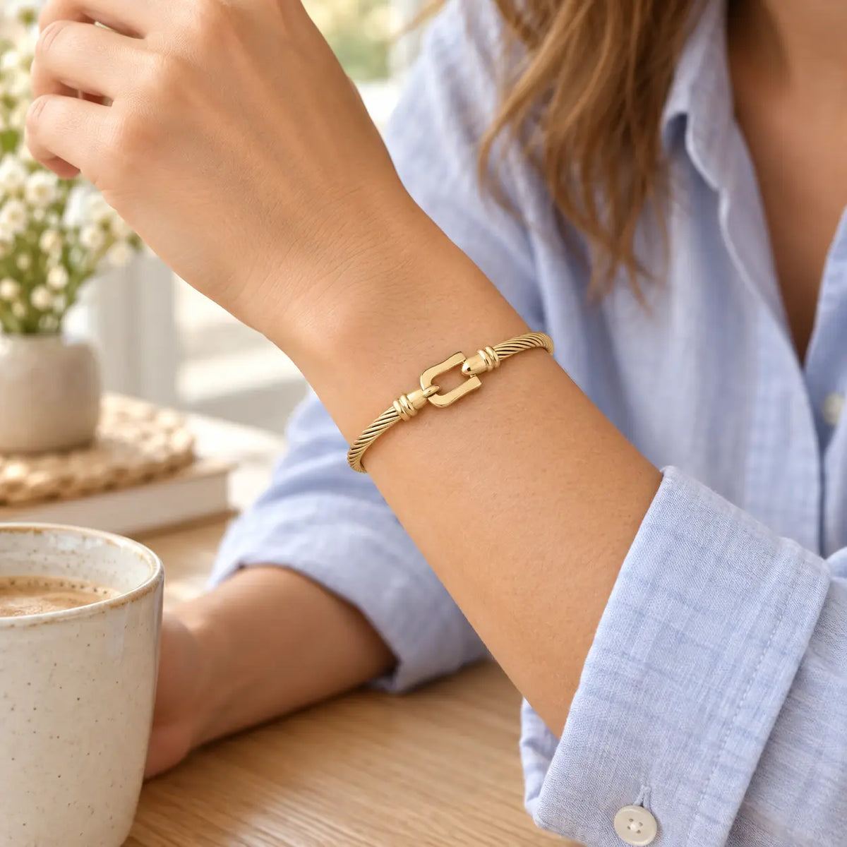 woman wearing twisted cable bucket bangle bracelet