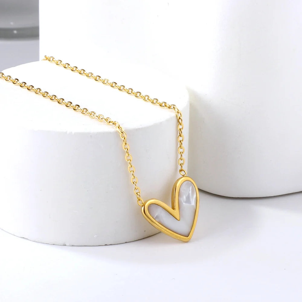 two tone heart pendant on display