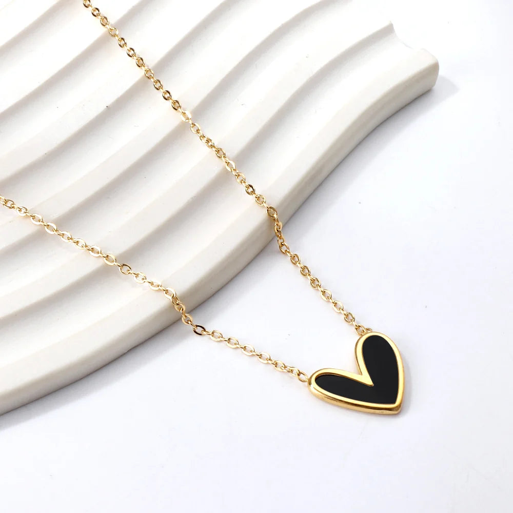 black two tone heart pendant on display