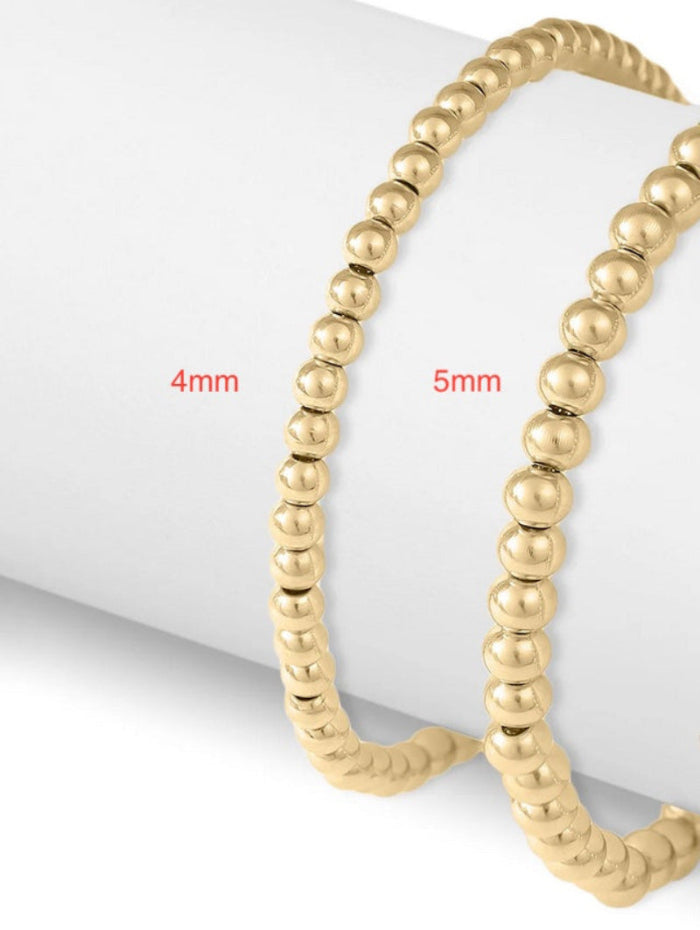 18K gold PVD coated waterproof, non-tarnish, hypoallergenic stretch bracelet.