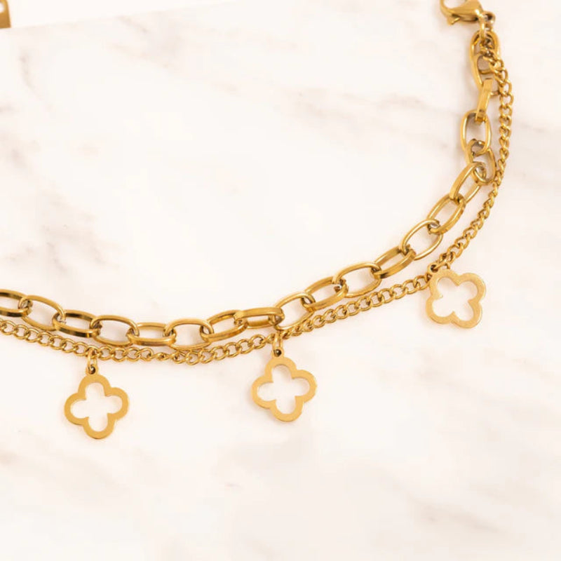 18K gold PVD coated waterproof, non-tarnish, hypoallergenic clover bracelet.